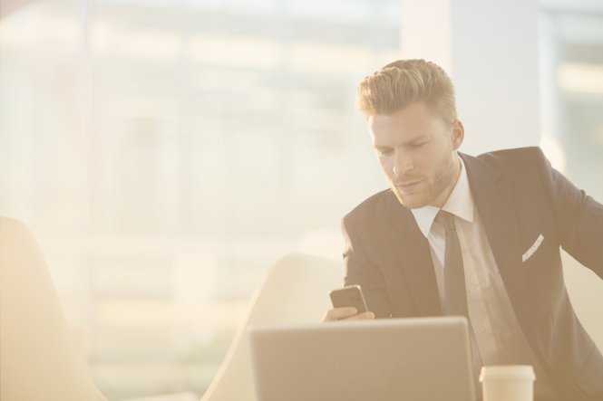 What is unified communications? It's how this man can carry a phone call from his laptop to his smartphone.