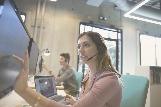 Multiple employees talking on phones making the IT director ask,