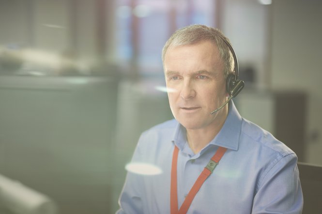 Man working in a cloud contact center.