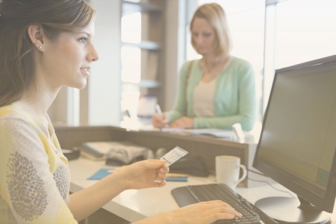 A client checking in at an office that uses digital dental