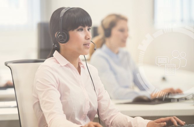 A woman wearing a phone headset providing airline contact center solutions to a customer