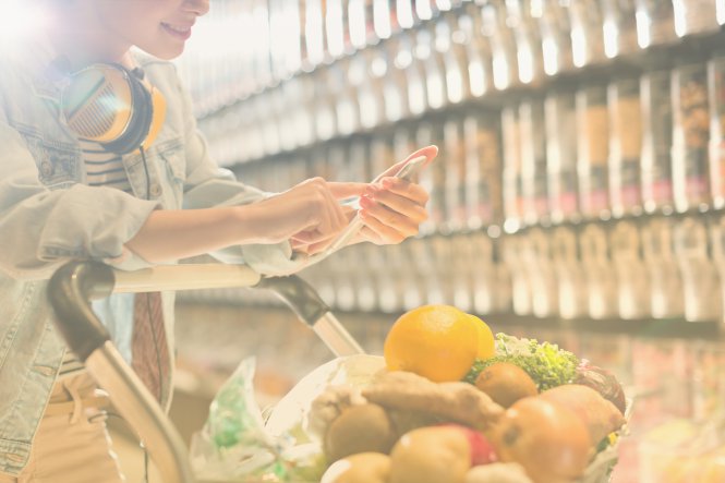 A health food shopper enjoys the benefits of geofencing, getting a message about a clinic nearby.