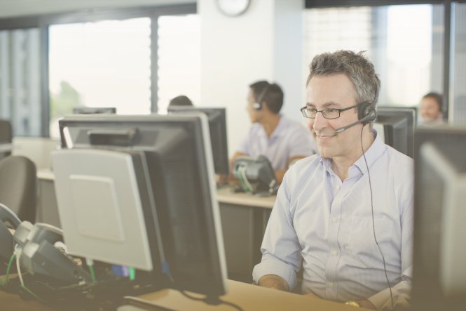 Gamification in business in action: Contact center agent sitting at his computer