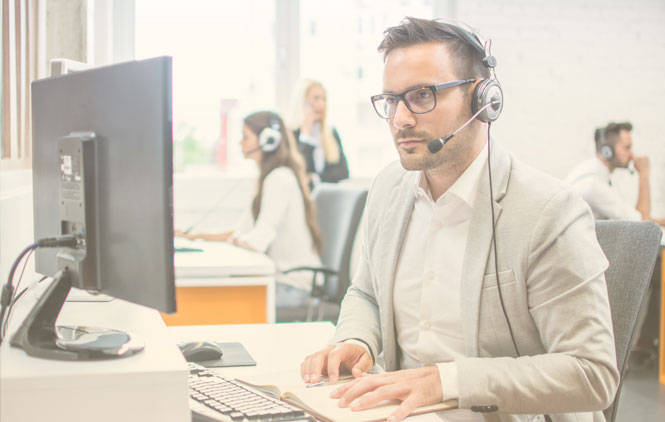 Guy Looking intense while AI saves the Contact Center