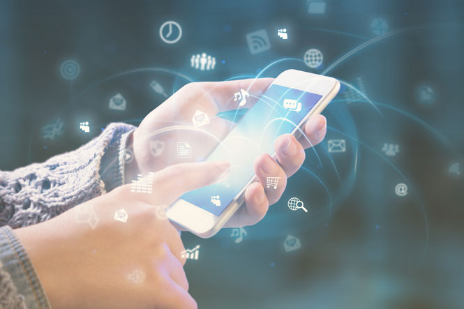 person's hand using iphone