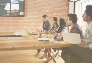 What is QoS? It's the reason this video conference is coming through clearly.