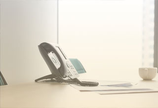 SIP trunking explained: Customers congregate in a retail shop utilizing the technology.