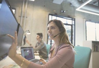 Multiple employees talking on phones making the IT director ask, "How many SIP trunks do I need?"