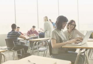 Students accessing technology on campus with SD-WAN solutions