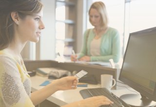 A client checking in at an office that uses digital dental