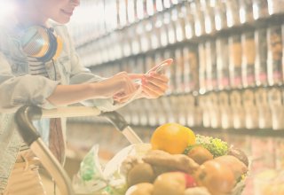 A health food shopper enjoys the benefits of geofencing, getting a message about a clinic nearby.