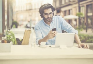 A person using a mobile banking solution on a smartphone.
