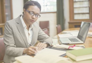 A lawyer engaged in legal practice management