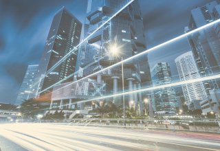 Cityscape with lines indicating fast speed and connectivity — benefits of UCaaS