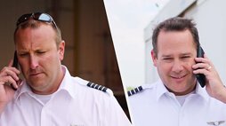 Business men having a telephone conversation